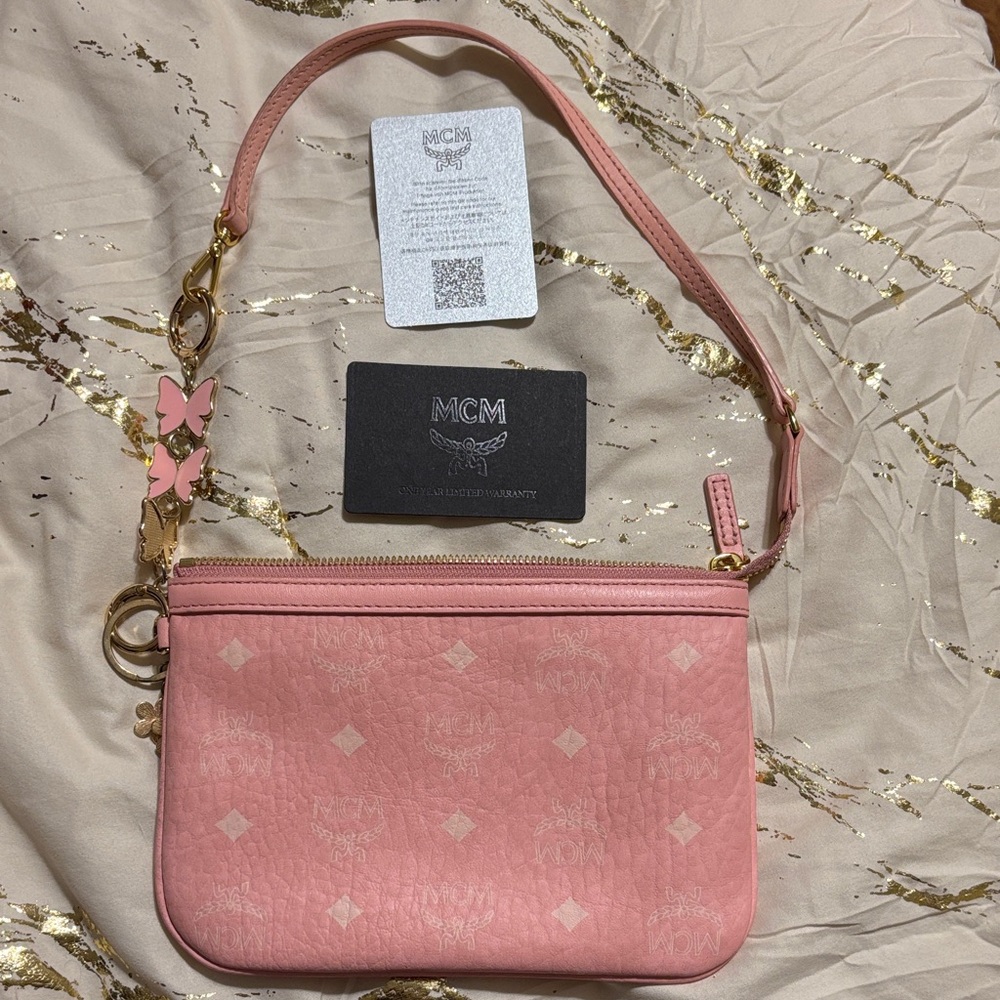 ‼️sold‼️MCM Pink Leather Clutch with Gold Accents